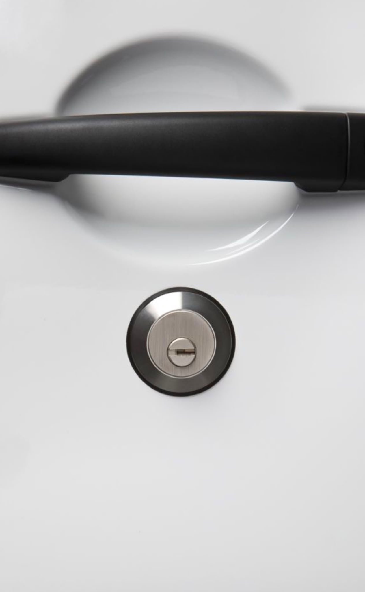 Slam lock fitted to a van door handle
